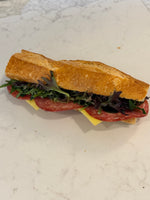 A Le 76 salami baguette with salad