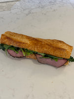 A Le 76 pastrami baguette with salad